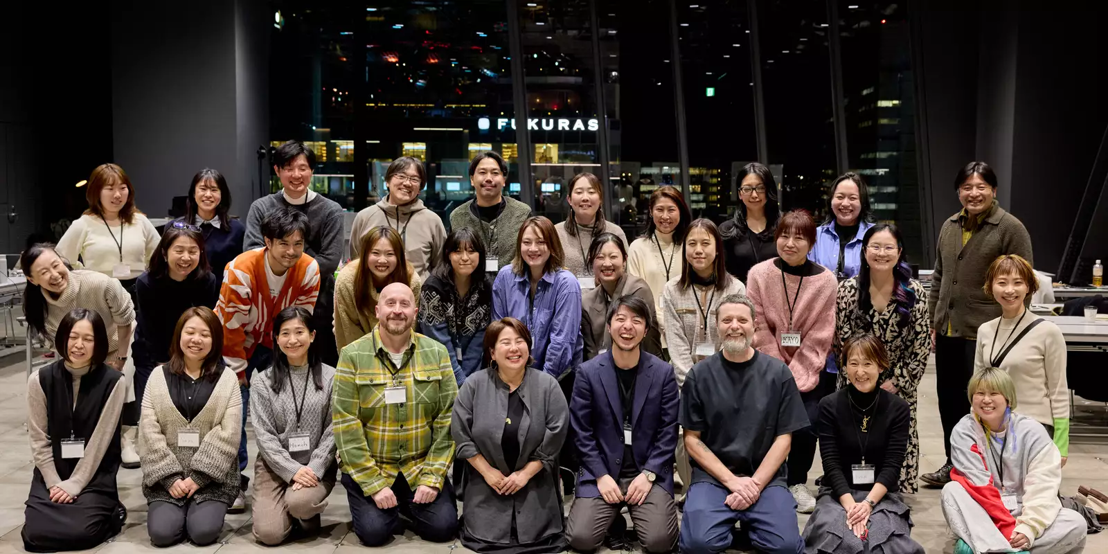 A large group photo of a producer training course